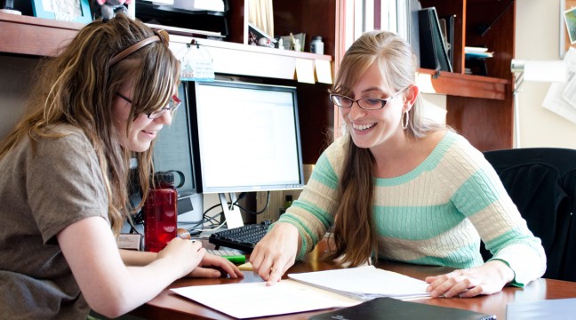 Financial aid administrator talking to a student.