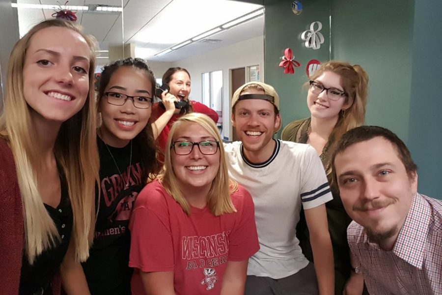 Front Desk Team posing for National Selfie Day